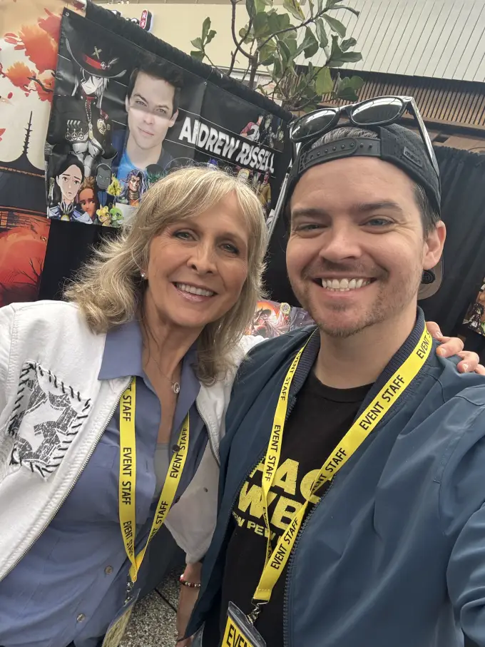 Andrew Russell meeting a fan at a convention