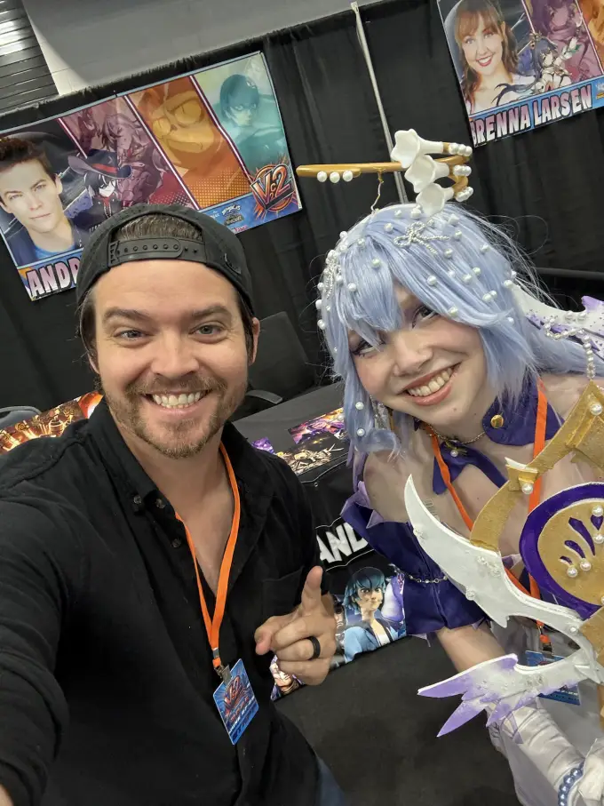 Andrew Russell with an elaborately costumed convention attendee