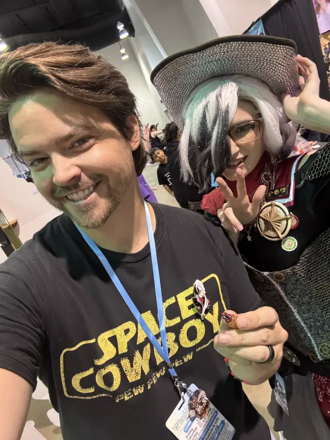 Andrew Russell sharing a playful fan photo at a convention
