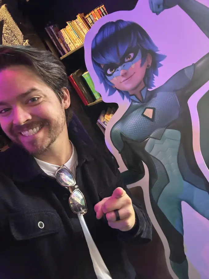 Andrew Russell at an animation character display