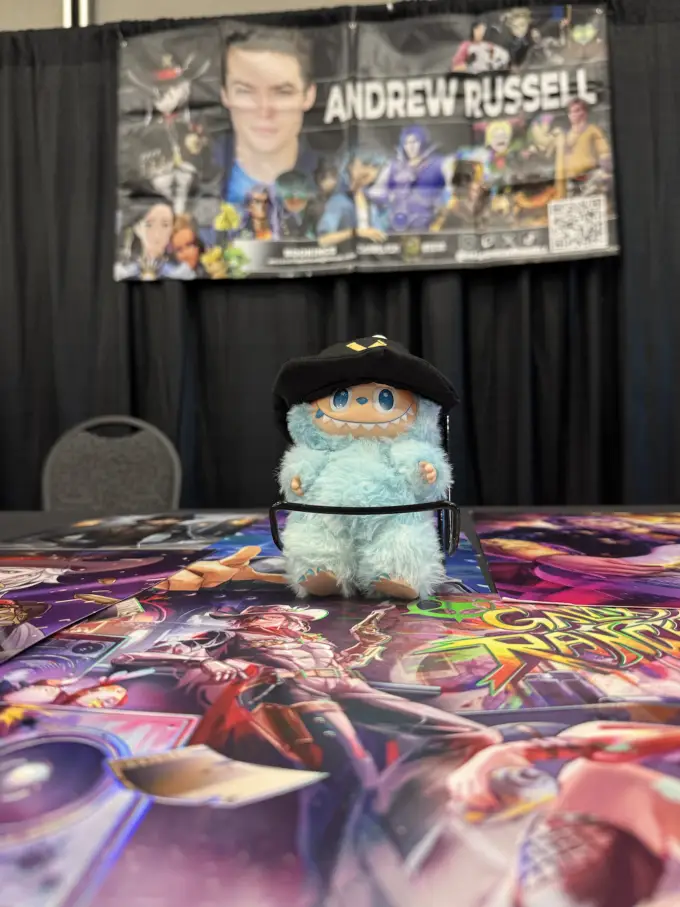 Andrew Russell's fully stocked autograph table at a convention