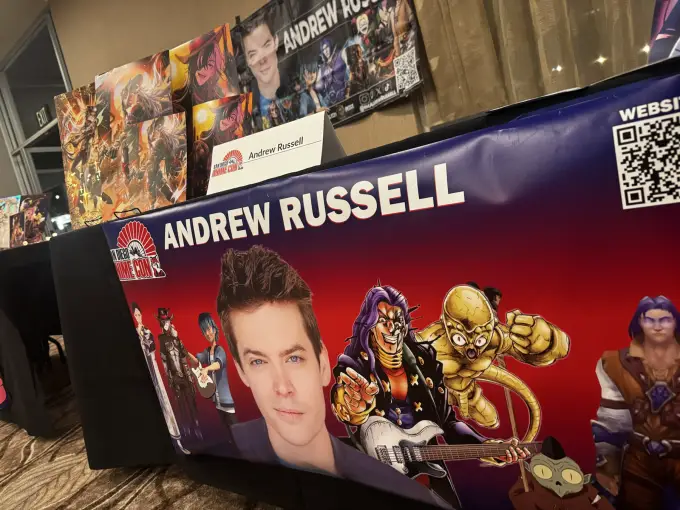 Andrew Russell convention guest banner featuring major character credits