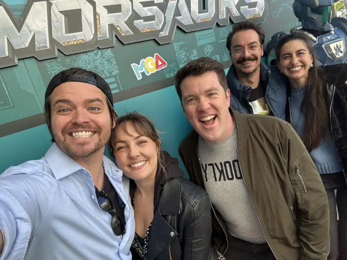 Andrew Russell with fellow Armorsaurs cast members at a fan event
