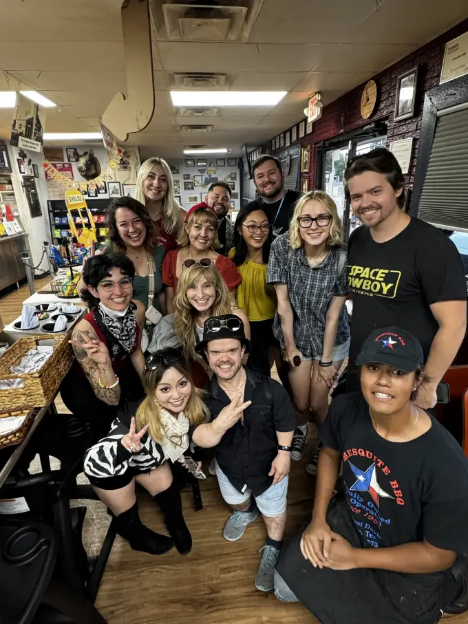 Andrew Russell with a large group of fans after an event