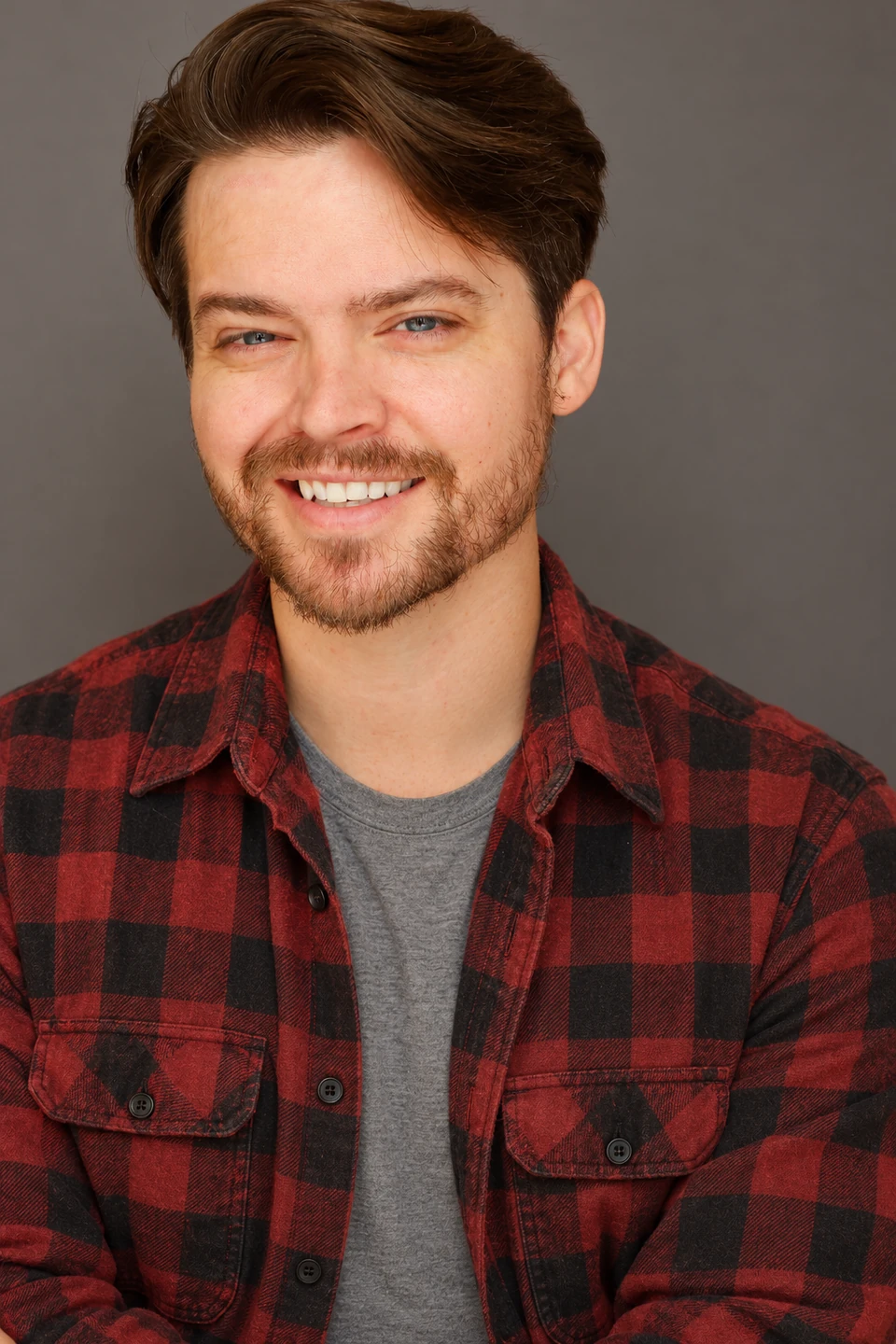 Andrew Russell wearing a red plaid shirt
