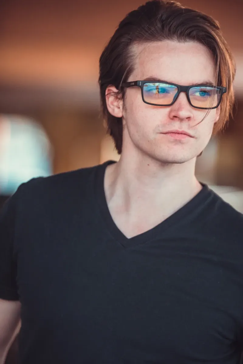 Andrew Russell casual portrait in a slate shirt