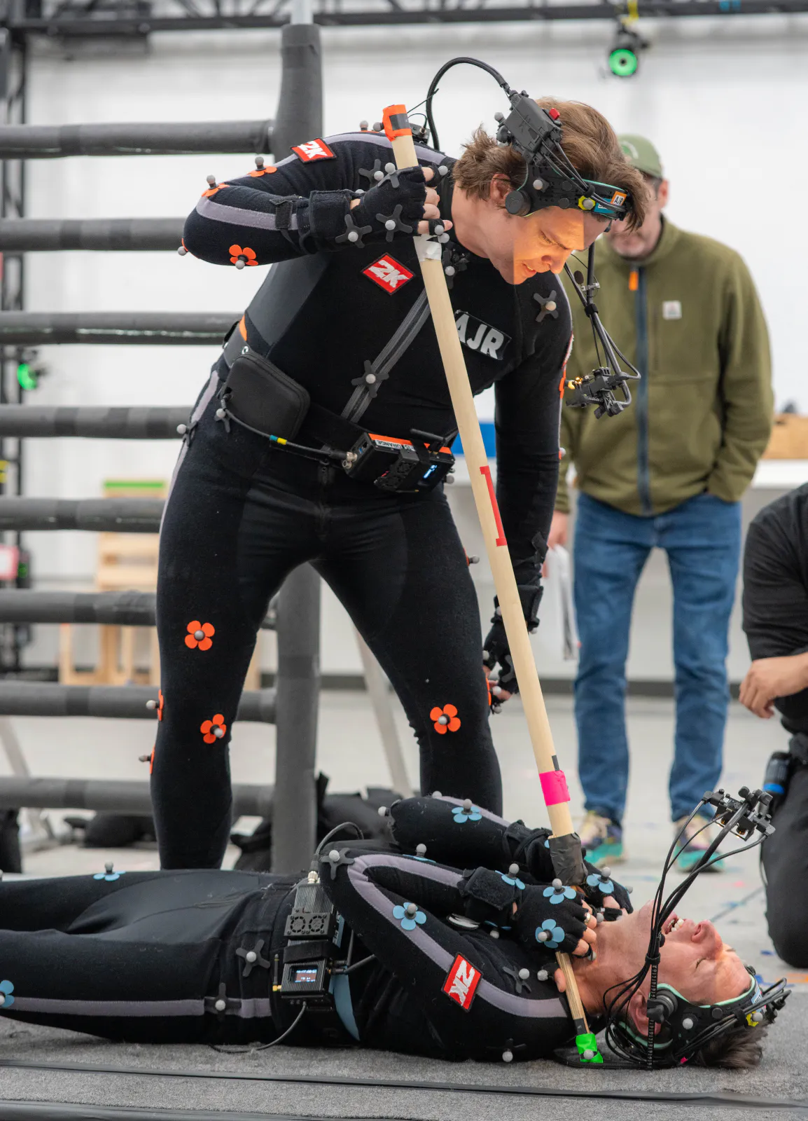Andrew Russell performing a physical action scene in a full performance-capture suit